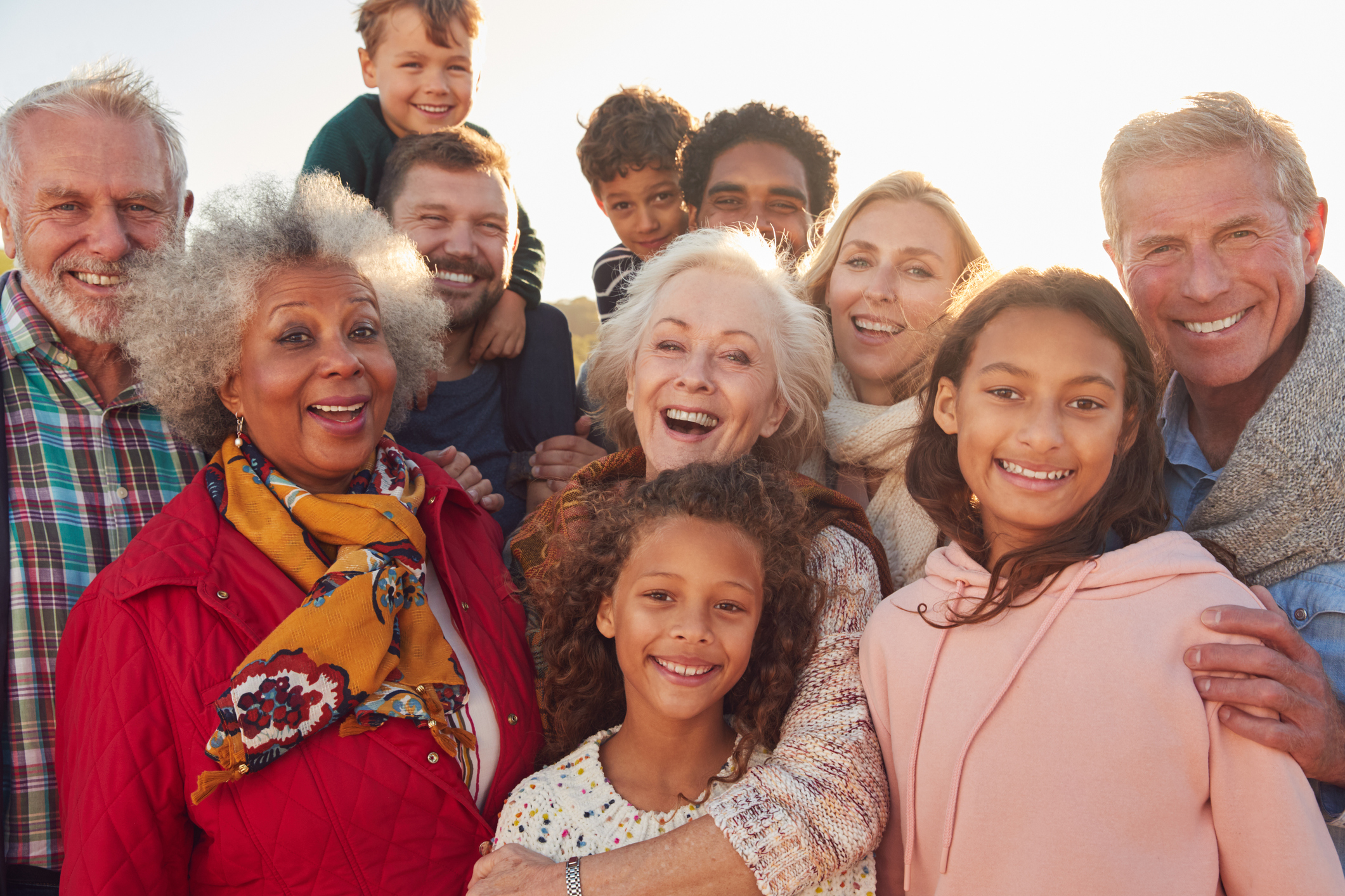 Portrait Of Multi-Generation Family Group On Winter Beach Vacation